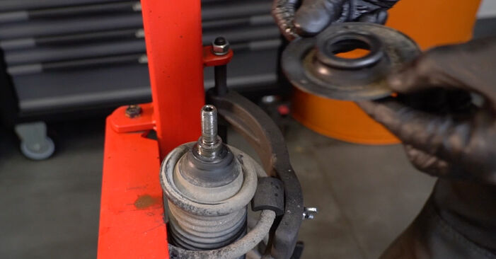 Come rimuovere VW POLO 1.6 2013 Molla Ammortizzatore - istruzioni online facili da seguire