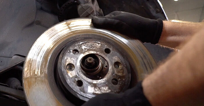 How to replace RENAULT SCÉNIC II (JM0/1_) 1.9 dCi 2004 Brake Discs - step-by-step manuals and video guides