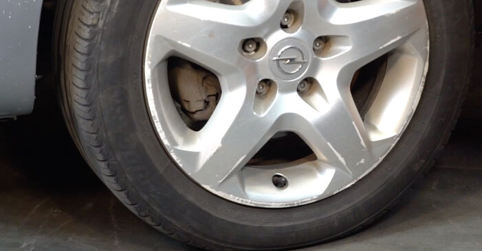 How to remove OPEL ZAFIRA 1.6 CNG (M75) 2009 Control Arm - online easy-to-follow instructions