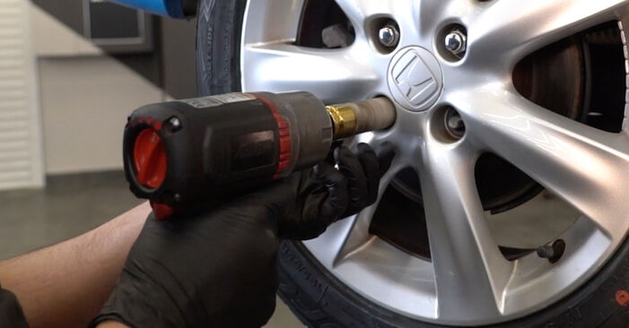 How to remove HONDA INSIGHT 1.3 IMA (ZE2) 2013 Brake Pads - online easy-to-follow instructions