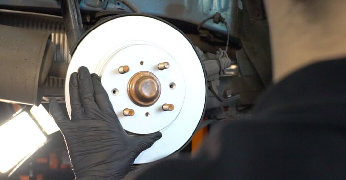 Changing Brake Discs on HONDA INSIGHT (ZE_) 1.3 IMA (ZE28, ZE2) 2012 by yourself