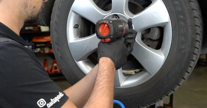 How to remove SKODA OCTAVIA 2.0 TDI 4x4 2008 Brake Pads - online easy-to-follow instructions