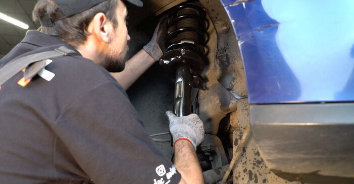 How to replace VW Passat Variant (3C5) 2.0 TDI 2006 Shock Absorber - step-by-step manuals and video guides