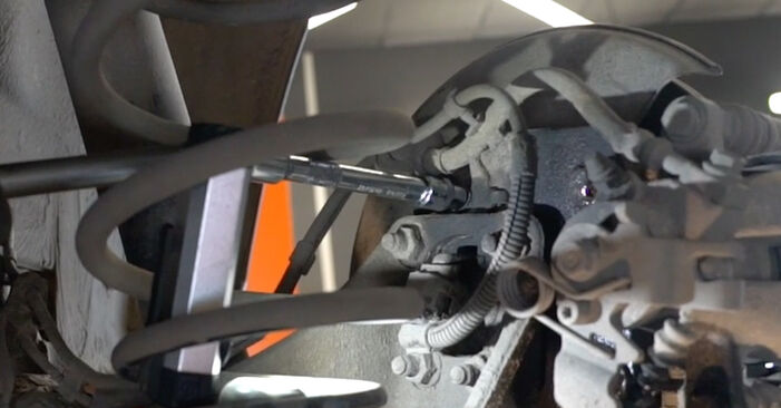 Kako težko to naredite sami: Zavorni kolut zamenjava na Opel Astra H Sedan 1.6 (L69) 2013 - prenesite slikovni vodnik
