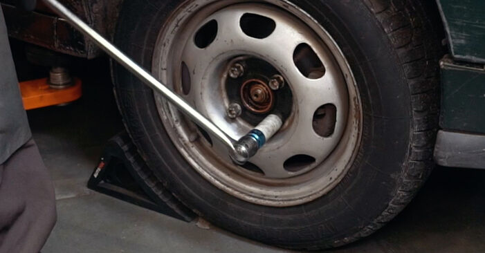 How to remove VW POLO 55 1.3 1998 Shock Absorber - online easy-to-follow instructions