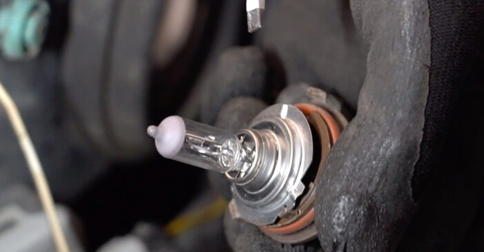 Changing of Headlight Bulb on Opel Combo C 2009 won't be an issue if you follow this illustrated step-by-step guide
