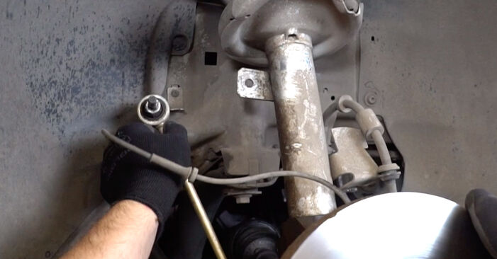 How to change Shock Absorber on Ford Focus DB3 2006 - free PDF and video manuals