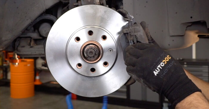 How to remove OPEL ASTRA 1.7 CDTi (F70) 2003 Brake Discs - online easy-to-follow instructions