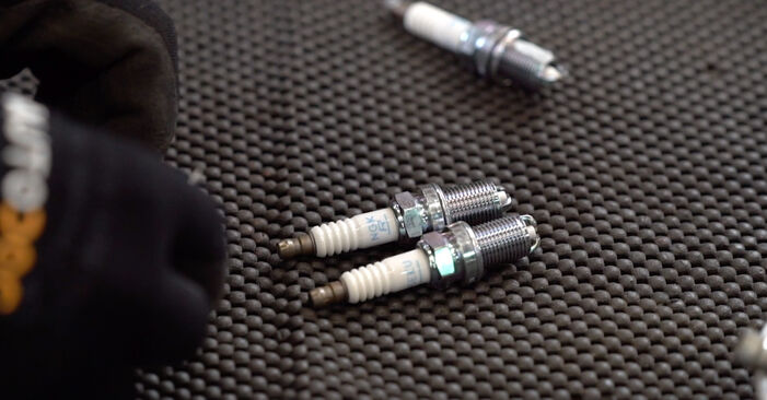 Changing of Spark Plug on Opel Vectra C CC 2002 won't be an issue if you follow this illustrated step-by-step guide