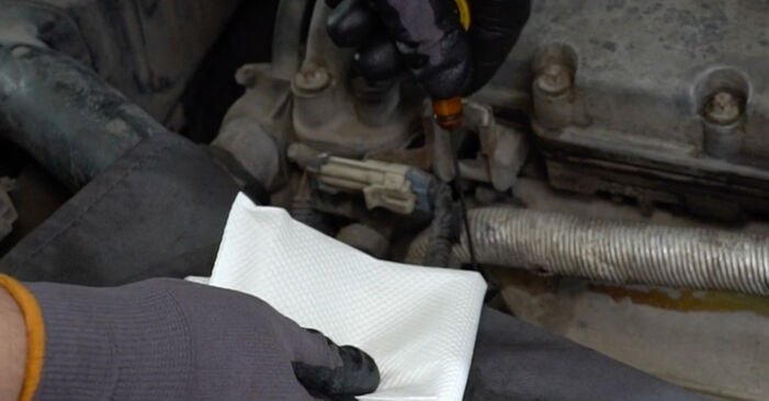 Changing of Oil Filter on Opel Vectra B CC 2003 won't be an issue if you follow this illustrated step-by-step guide
