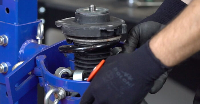 Cómo reemplazar Copelas Del Amortiguador en un VW Jetta Mk5 (1K) 2010: descargue manuales en PDF e instrucciones en video