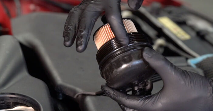 DIY replacement of Oil Filter on BMW 3 Convertible (E93) 320 i 2012 is not an issue anymore with our step-by-step tutorial