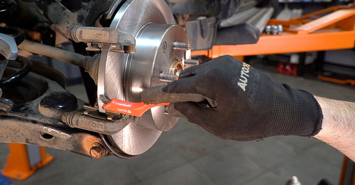 Changing of Brake Pads on Matrix E140 2009 won't be an issue if you follow this illustrated step-by-step guide