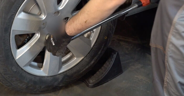 How to remove AUDI A6 2.7 TDI quattro 2009 Shock Absorber - online easy-to-follow instructions