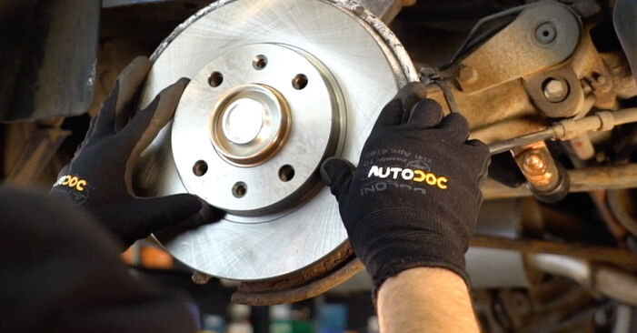 Changing Brake Discs on PEUGEOT 306 Convertible (7D, N3, N5) 2.0 16V 1997 by yourself