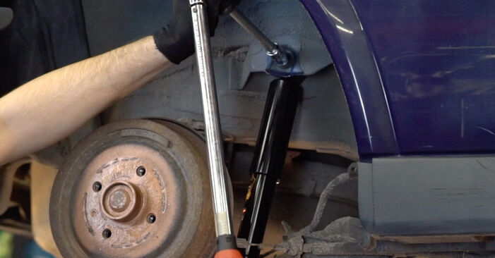How to change Shock Absorber on OPEL ASTRA F CLASSIC Estate 1998 - free PDF and video manuals