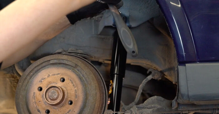 How to change Shock Absorber on OPEL Astra G Coupe (T98) 2000 - tips and tricks