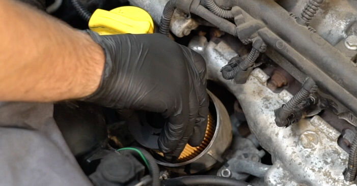 How to remove OPEL ASTRA 1.9 CDTI 16V (L70) 2008 Oil Filter - online easy-to-follow instructions