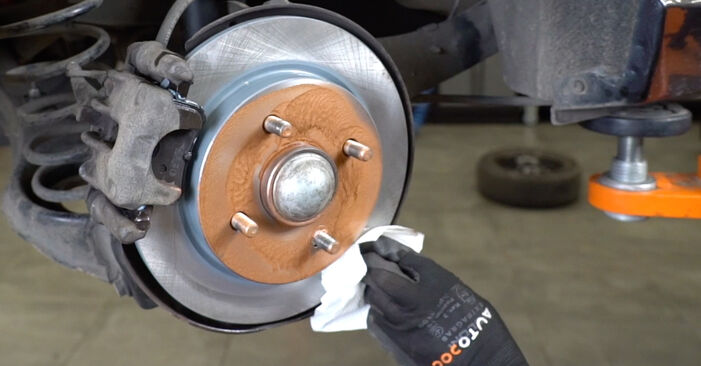 How to change Brake Discs on FORD SCORPIO II (GFR, GGR) 1996 - tips and tricks