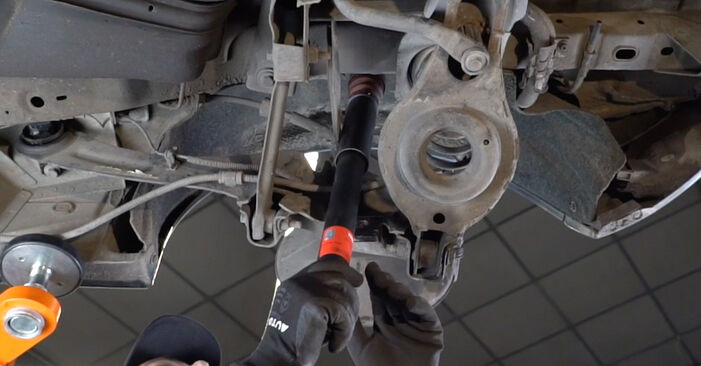 How to replace FORD FOCUS Saloon (DFW) 1.6 16V 2000 Shock Absorber - step-by-step manuals and video guides