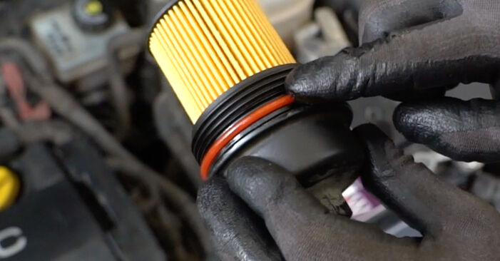 How to change Oil Filter on OPEL ASTRA CLASSIC Saloon 2009 - free PDF and video manuals