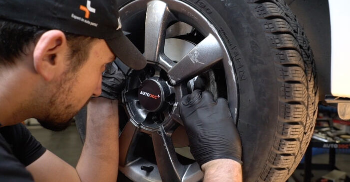Sostituzione Ammortizzatori posteriori e anteriori su Seat Ibiza IV Sportcoupe 1.6 TDI 2014 - scarica la guida illustrata