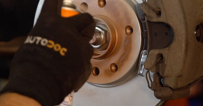 How to remove VAUXHALL COMBO 1.6 CNG 16V 2005 Brake Pads - online easy-to-follow instructions