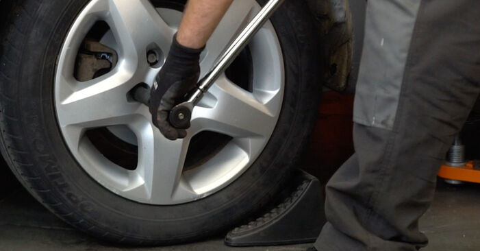 How to remove VAUXHALL ASTRA 1.4 i 16V (L08) 2009 Brake Discs - online easy-to-follow instructions