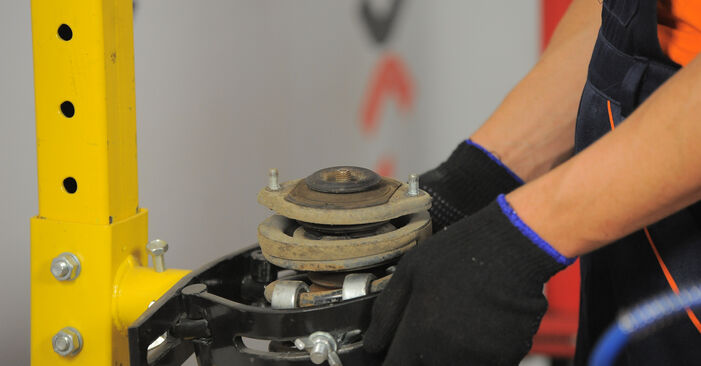 Replacing Strut Mount on VAUXHALL TIGRA Mk I (F07) 1997 1.4 16V by yourself