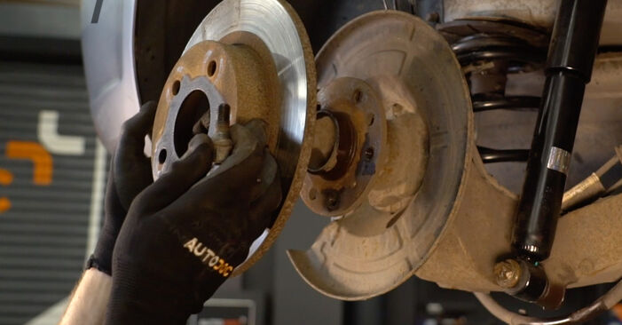 Changing Brake Discs on OPEL Meriva B (S10) 1.4 LPG (75) 2013 by yourself