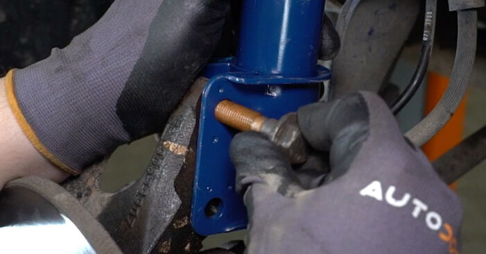 How to remove VAUXHALL COMBO 1.7 D 1998 Shock Absorber - online easy-to-follow instructions