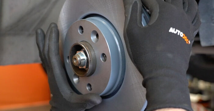 Wie man Bremsscheiben beim Nissan Tiida SС11 2004 wechselt - Gratis PDF- und Video-Tutorials