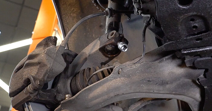 How to remove RENAULT GRAND SCÉNIC 1.6 2008 Shock Absorber - online easy-to-follow instructions