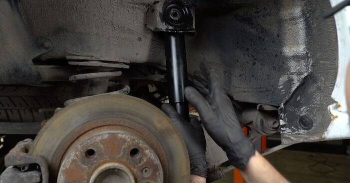 How to change Shock Absorber on VAUXHALL Zafira Mk I (A) (T98) 2002 - tips and tricks