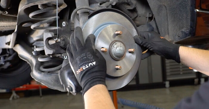 How to replace FORD FOCUS Saloon (DFW) 1.6 16V 2000 Brake Discs - step-by-step manuals and video guides