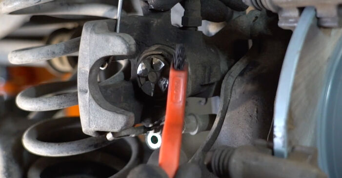 Wie kompliziert ist es, selbst zu reparieren: Bremsscheiben am Ford Focus mk1 Limousine 2.0 2005 ersetzen – Laden Sie sich illustrierte Wegleitungen herunter
