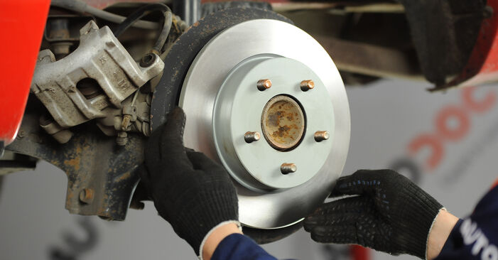 Стъпка по стъпка препоруки за самостоятелна смяна на Mazda 3 BK 2009 1.3 (BK14) Спирачен диск