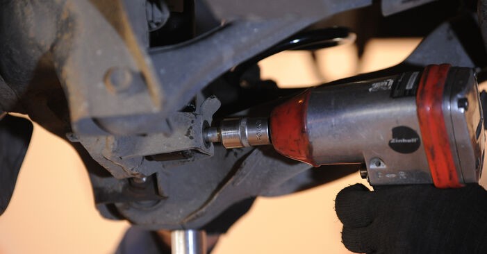 How to remove MAZDA 3 1.3 (BK14) 2007 Shock Absorber - online easy-to-follow instructions