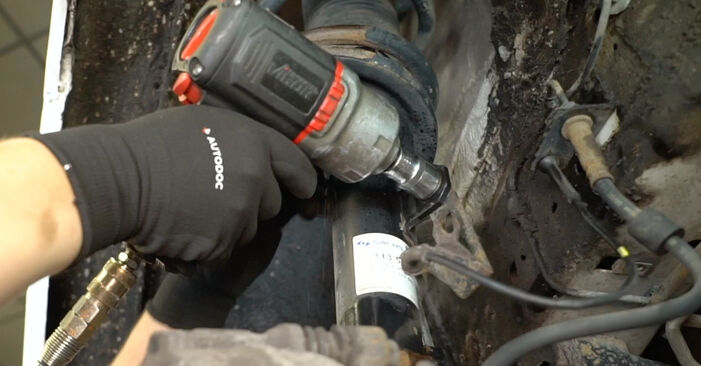 Changing Shock Absorber on FORD TRANSIT MK-7 Box 2.4 TDCi RWD 2009 by yourself