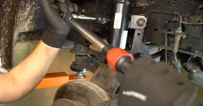 Changing Strut Mount on FORD TRANSIT MK-7 Box 2.4 TDCi RWD 2009 by yourself