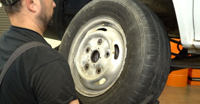 Stapsgewijze aanbevelingen om zelf Ford Transit Mk5 Bus 2006 2.4 DI RWD (F_B_, F_C_, F_A_) Handremkabel vervangen