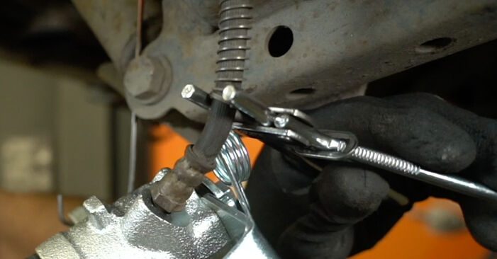 Como remover OPEL VIVARO 1.9 DI (F7, J7, A07) 2005 Pinças de Travão - instruções online fáceis de seguir